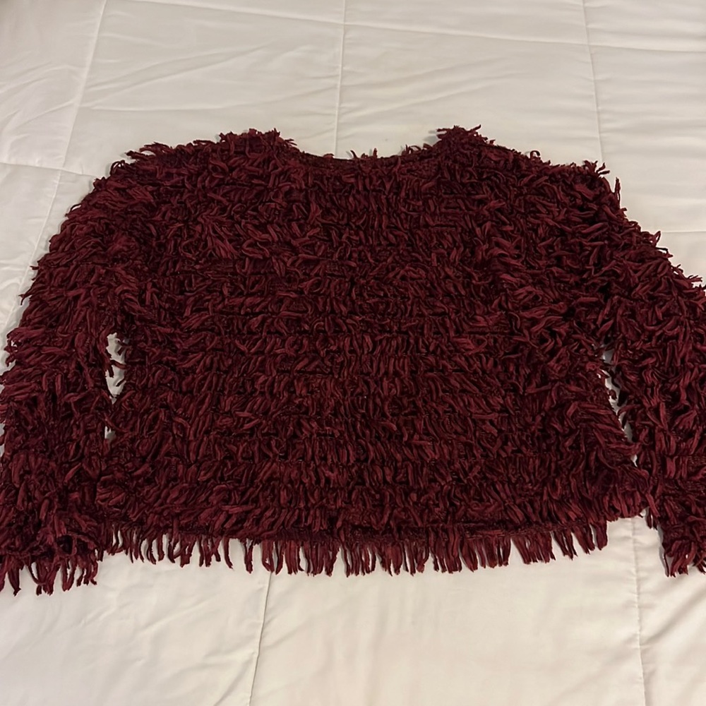 Shredded sweater